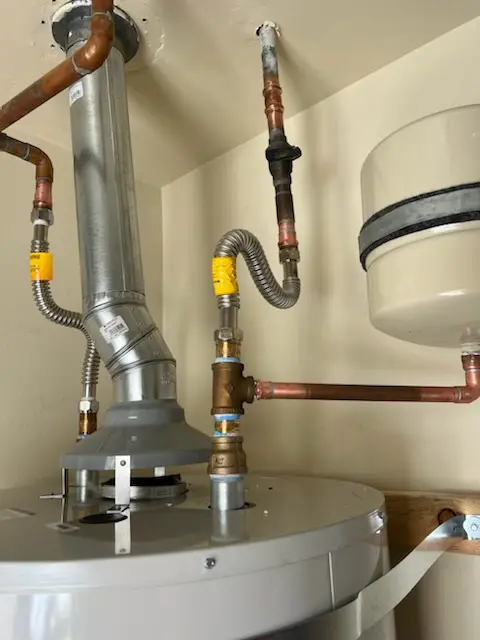Water heater installation and plumbing repair in Creekwood